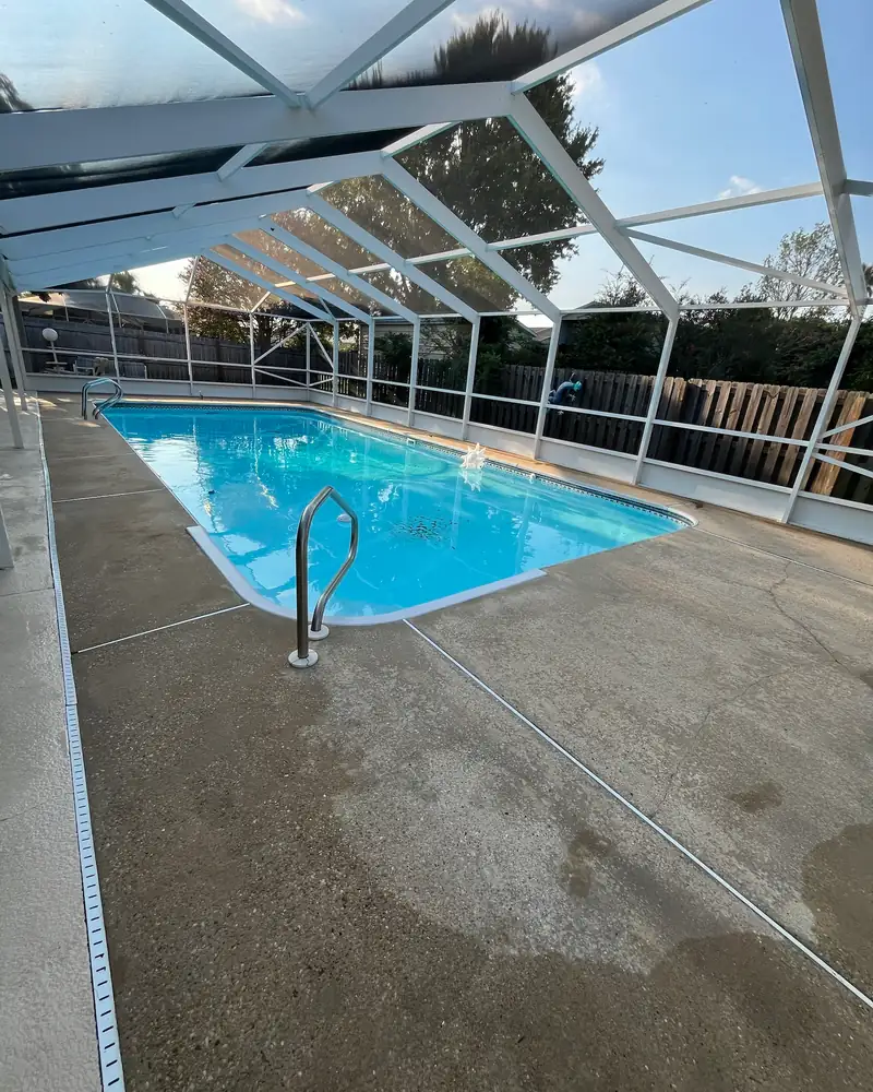 The same pool deck after pressure washing
